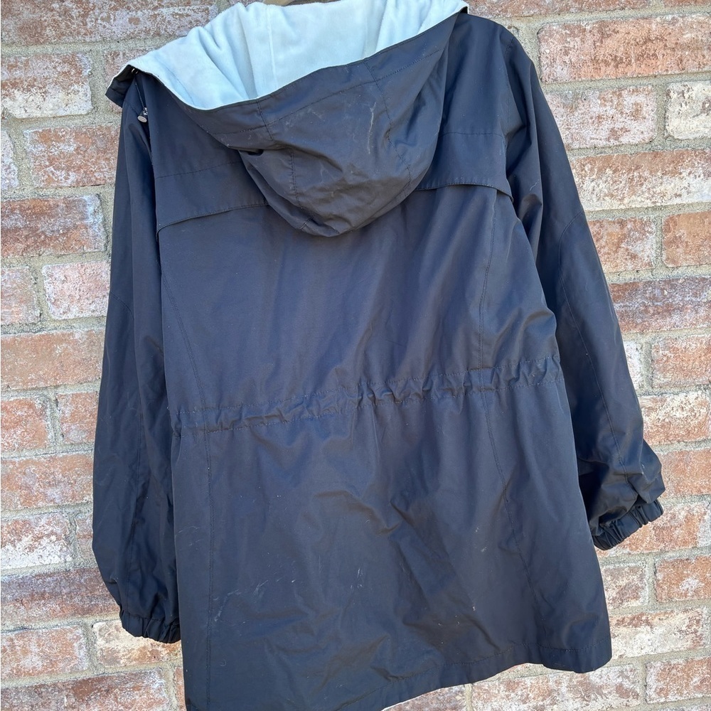 Reversible rain jacket - Picture 2 of 5